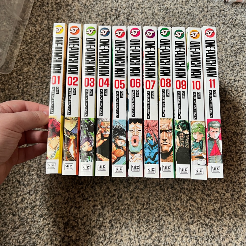 One punch man manga volumes 1-11 fair to good condition